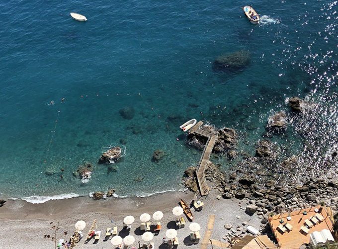 exclusive beach Amalfi crystal clear water